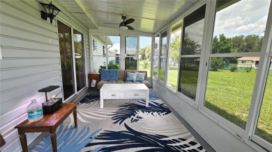 This two-bedroom, two-bathroom home with a two-car garage is on Royal Oaks Golf Club in Florida - for sale on GolfHomes.com, golf home, golf lot