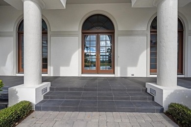 This Custom-built residence is thoughtfully designed to capture on The Loxahatchee Club in Florida - for sale on GolfHomes.com, golf home, golf lot