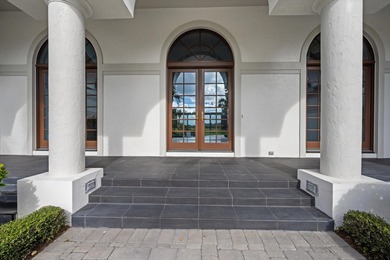 This Custom-built residence is thoughtfully designed to capture on The Loxahatchee Club in Florida - for sale on GolfHomes.com, golf home, golf lot