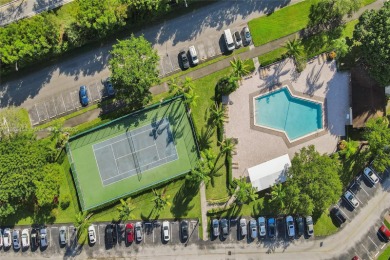 ENJOY ENDLESS GOLF COURSE VIEWS FROM YOUR FIRST FLOOR CONDO WITH on  in Florida - for sale on GolfHomes.com, golf home, golf lot