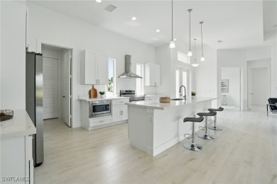 Luxury Waterfront New Construction - Loaded with Upgrades!
This on Coral Oaks Golf Course in Florida - for sale on GolfHomes.com, golf home, golf lot