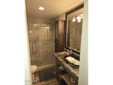 Experience effortless mountain living in this beautifully on Headwaters Golf Course At Granby Ranch in Colorado - for sale on GolfHomes.com, golf home, golf lot