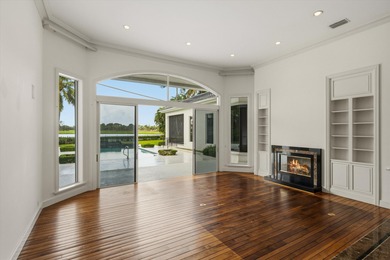 This Custom-built residence is thoughtfully designed to capture on The Loxahatchee Club in Florida - for sale on GolfHomes.com, golf home, golf lot