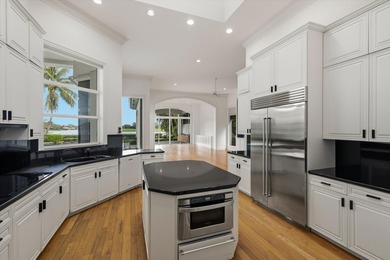 This Custom-built residence is thoughtfully designed to capture on The Loxahatchee Club in Florida - for sale on GolfHomes.com, golf home, golf lot