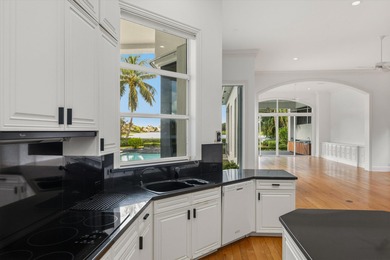 This Custom-built residence is thoughtfully designed to capture on The Loxahatchee Club in Florida - for sale on GolfHomes.com, golf home, golf lot