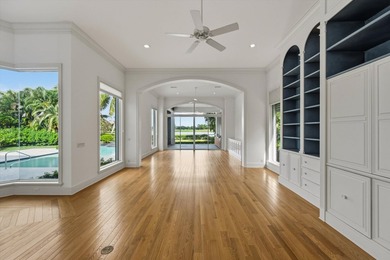 This Custom-built residence is thoughtfully designed to capture on The Loxahatchee Club in Florida - for sale on GolfHomes.com, golf home, golf lot