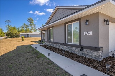 Exceptional build at an affordable price by a well-known local on Pine Ridge Community Golf and Country Club in Florida - for sale on GolfHomes.com, golf home, golf lot