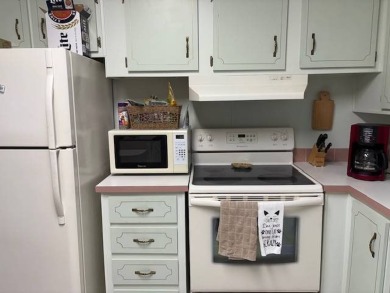 This home is in a 55 plus community with a monthly lot rent of on Crystal Lake Club in Florida - for sale on GolfHomes.com, golf home, golf lot