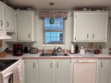 This home is in a 55 plus community with a monthly lot rent of on Crystal Lake Club in Florida - for sale on GolfHomes.com, golf home, golf lot
