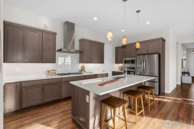 Beautiful and nearly new, this ranch-style home in Northern on Raindance National Golf Course in Colorado - for sale on GolfHomes.com, golf home, golf lot