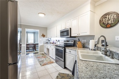 Assumable VA loan available at an amazing 2.5%! Enjoy golf on Kings Grant Golf and Country Club in North Carolina - for sale on GolfHomes.com, golf home, golf lot