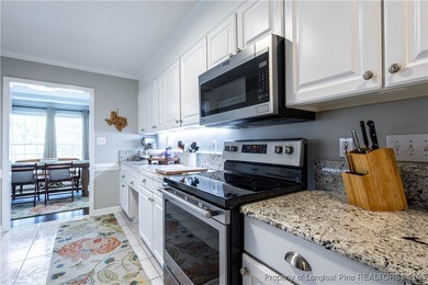 Assumable VA loan available at an amazing 2.5%! Enjoy golf on Kings Grant Golf and Country Club in North Carolina - for sale on GolfHomes.com, golf home, golf lot