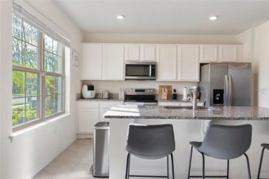 Charming Interior Unit Townhome with Courtyard Views in on Orange County National Golf Center and Lodge in Florida - for sale on GolfHomes.com, golf home, golf lot