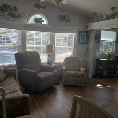 This large furnished 1/1 is located in The Waves RV Resort, a 55 on The Rookery At Marco in Florida - for sale on GolfHomes.com, golf home, golf lot