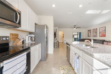 Charming Interior Unit Townhome with Courtyard Views in on Orange County National Golf Center and Lodge in Florida - for sale on GolfHomes.com, golf home, golf lot