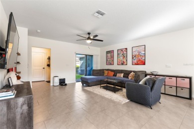 Charming Interior Unit Townhome with Courtyard Views in on Orange County National Golf Center and Lodge in Florida - for sale on GolfHomes.com, golf home, golf lot