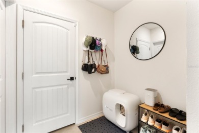Charming Interior Unit Townhome with Courtyard Views in on Orange County National Golf Center and Lodge in Florida - for sale on GolfHomes.com, golf home, golf lot