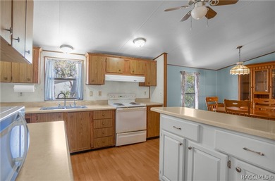 This 2 bedroom, 2 bathroom doublewide mobile home (1988) is on Inverness Golf and Country Club in Florida - for sale on GolfHomes.com, golf home, golf lot