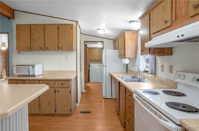 This 2 bedroom, 2 bathroom doublewide mobile home (1988) is on Inverness Golf and Country Club in Florida - for sale on GolfHomes.com, golf home, golf lot