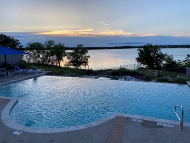 Step inside this charming, timeliness and beautiful maintained on Stewart Peninsula Golf Course in Texas - for sale on GolfHomes.com, golf home, golf lot