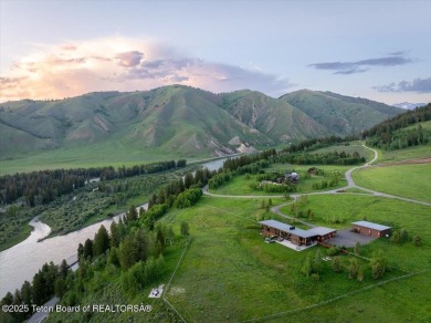 Perched above the Snake River with commanding views of Wolf on Snake River Sporting Club in Wyoming - for sale on GolfHomes.com, golf home, golf lot