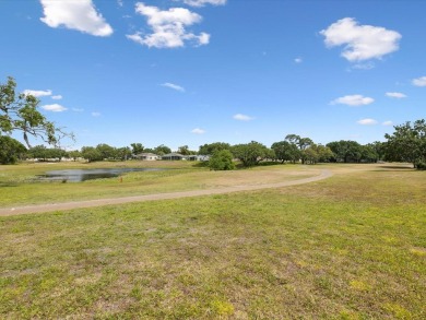 One or more photo(s) has been virtually staged. RESORT STYLE on Meadow Oaks Golf and Country Club in Florida - for sale on GolfHomes.com, golf home, golf lot