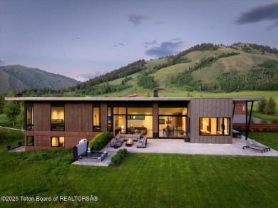 Perched above the Snake River with commanding views of Wolf on Snake River Sporting Club in Wyoming - for sale on GolfHomes.com, golf home, golf lot