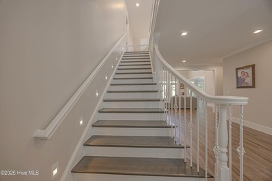 Upscale living with long golf views of Hole #3 of the on River Landing Golf Course in North Carolina - for sale on GolfHomes.com, golf home, golf lot