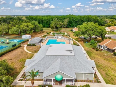 One or more photo(s) has been virtually staged. RESORT STYLE on Meadow Oaks Golf and Country Club in Florida - for sale on GolfHomes.com, golf home, golf lot