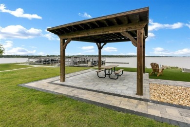 Lock  leave this luxurious home in 24-7 guarded waterfront on The Golf Club at Resort Eagle Mountain Lake in Texas - for sale on GolfHomes.com, golf home, golf lot