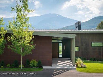 Perched above the Snake River with commanding views of Wolf on Snake River Sporting Club in Wyoming - for sale on GolfHomes.com, golf home, golf lot