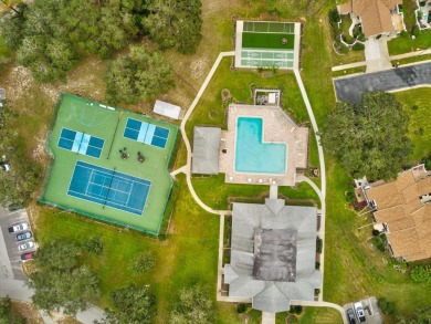 One or more photo(s) has been virtually staged. RESORT STYLE on Meadow Oaks Golf and Country Club in Florida - for sale on GolfHomes.com, golf home, golf lot