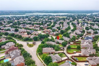 Step inside this charming, timeliness and beautiful maintained on Stewart Peninsula Golf Course in Texas - for sale on GolfHomes.com, golf home, golf lot
