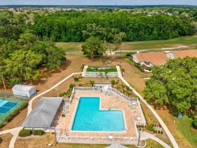 One or more photo(s) has been virtually staged. RESORT STYLE on Meadow Oaks Golf and Country Club in Florida - for sale on GolfHomes.com, golf home, golf lot