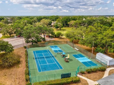 One or more photo(s) has been virtually staged. RESORT STYLE on Meadow Oaks Golf and Country Club in Florida - for sale on GolfHomes.com, golf home, golf lot