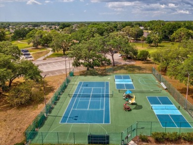 One or more photo(s) has been virtually staged. RESORT STYLE on Meadow Oaks Golf and Country Club in Florida - for sale on GolfHomes.com, golf home, golf lot
