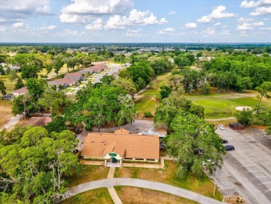 One or more photo(s) has been virtually staged. RESORT STYLE on Meadow Oaks Golf and Country Club in Florida - for sale on GolfHomes.com, golf home, golf lot