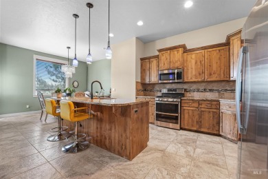 Gorgeous home located at the #12 hole of Red Hawk Golf Course on Hunters Point Golf Club in Idaho - for sale on GolfHomes.com, golf home, golf lot