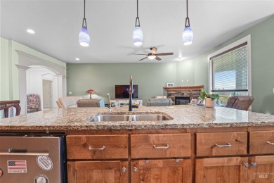Gorgeous home located at the #12 hole of Red Hawk Golf Course on Hunters Point Golf Club in Idaho - for sale on GolfHomes.com, golf home, golf lot