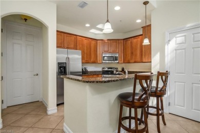Santa Isabella townhome on a quad at Ole' in Lely Resort. This on Lely Resort Golf and Country Club in Florida - for sale on GolfHomes.com, golf home, golf lot