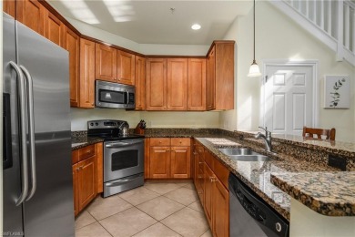 Santa Isabella townhome on a quad at Ole' in Lely Resort. This on Lely Resort Golf and Country Club in Florida - for sale on GolfHomes.com, golf home, golf lot