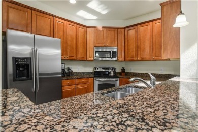 Santa Isabella townhome on a quad at Ole' in Lely Resort. This on Lely Resort Golf and Country Club in Florida - for sale on GolfHomes.com, golf home, golf lot