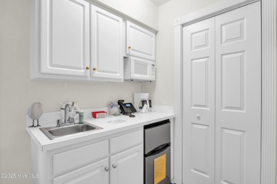 Discover the flexibility and income potential of this lockout on Brunswick Plantation and Golf Resorts in North Carolina - for sale on GolfHomes.com, golf home, golf lot