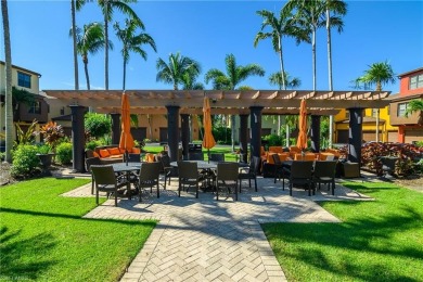 Santa Isabella townhome on a quad at Ole' in Lely Resort. This on Lely Resort Golf and Country Club in Florida - for sale on GolfHomes.com, golf home, golf lot