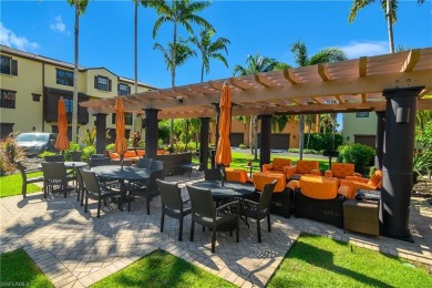 Santa Isabella townhome on a quad at Ole' in Lely Resort. This on Lely Resort Golf and Country Club in Florida - for sale on GolfHomes.com, golf home, golf lot