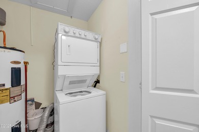 Discover the flexibility and income potential of this lockout on Brunswick Plantation and Golf Resorts in North Carolina - for sale on GolfHomes.com, golf home, golf lot