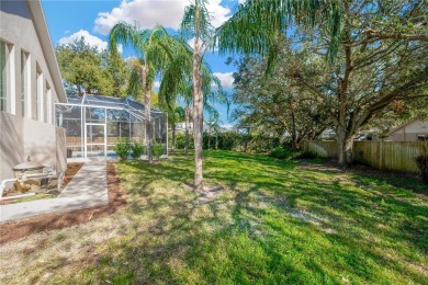 This stunning home has it all! With 4 bedrooms, 3 bathrooms, a on Bloomingdale Golfers Club in Florida - for sale on GolfHomes.com, golf home, golf lot