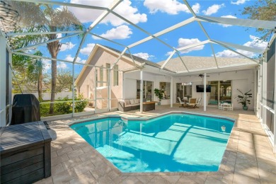 This stunning home has it all! With 4 bedrooms, 3 bathrooms, a on Bloomingdale Golfers Club in Florida - for sale on GolfHomes.com, golf home, golf lot