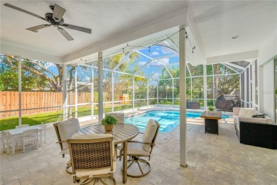 This stunning home has it all! With 4 bedrooms, 3 bathrooms, a on Bloomingdale Golfers Club in Florida - for sale on GolfHomes.com, golf home, golf lot