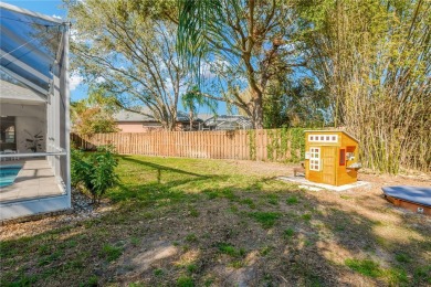 This stunning home has it all! With 4 bedrooms, 3 bathrooms, a on Bloomingdale Golfers Club in Florida - for sale on GolfHomes.com, golf home, golf lot